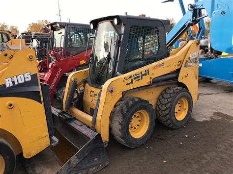 used gehl skid steer attachments